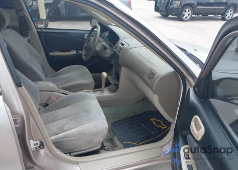 1999 Toyota Corolla Ce из США, поврежденный, VIN 1NXBR12E9XZ159403